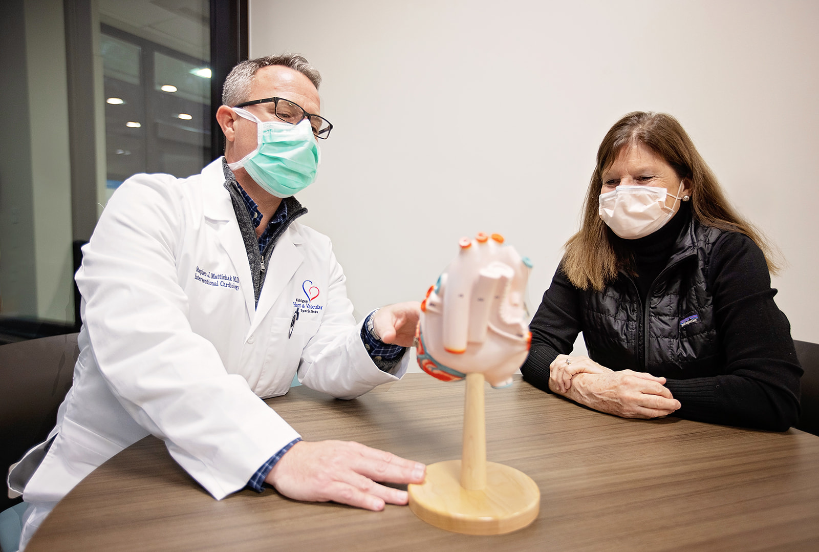 Doctor performing surgery with a team